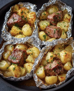 Juicy Garlic Butter Steak and Crispy Potato Foil Packets: A Weekly Craving!