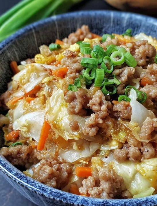 Bowl of Egg Roll with Ginger and Scallions